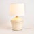 Woven in aWhitewash cane rattan, with subtle variations in color that makes each one truly unique, this lamp is an instant...
