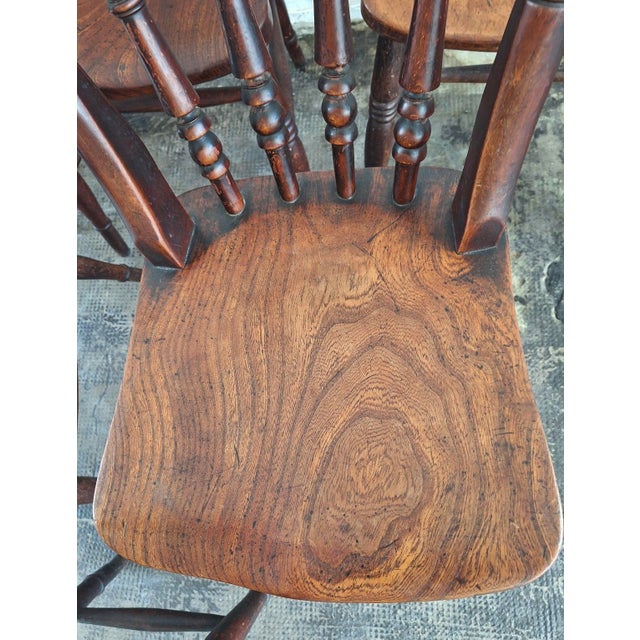 Antique set of 6 solid oak farmhouse dining chairs dating from the last part of the nineteenth century. The chairs have...