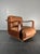 Lovely proportioned club or lounge chair in wood with reupholstered leather. According to the seller it originated form...
