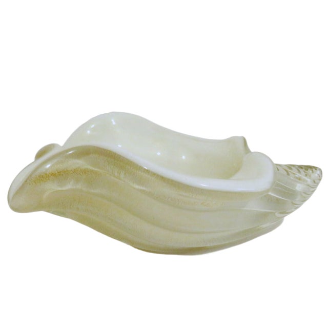 Vintage Murano winter-white cased blown glass bowl by Alfredo Barbini. The bowl has been fashioned in a conch shell-...