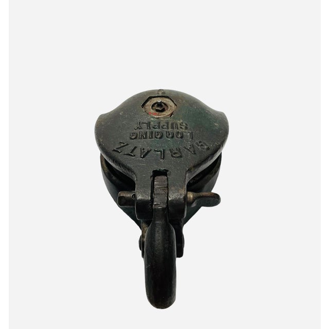 Antique heavy duty industrial pulley/ rigging block. This industrial pulley was using in the logging industry. Originated...