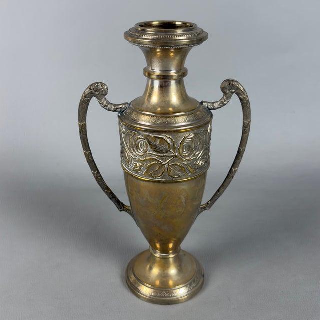 A refined triptych of decorative freestanding vases in embossed silver-plated metal, attributed to a 1930s/1940s...