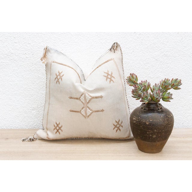 Introduce a touch of organic artistry to your home with our handcrafted 18-inch square cactus silk pillow cover. Woven...