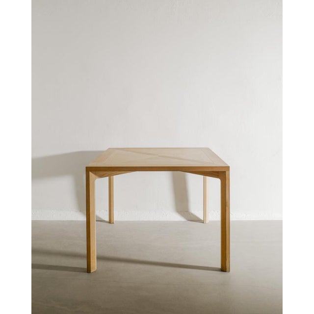 A rare danish squared wooden dining / side table in plain ash with a decorative cross inlay top and sculptural legs by...