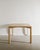 A rare danish squared wooden dining / side table in plain ash with a decorative cross inlay top and sculptural legs by...