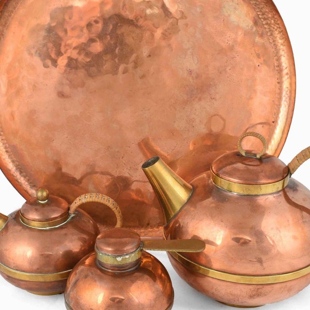 Copper Coffee Set is an original decorative group of objects realized between the 1950s and the 1960s. Original copper and...