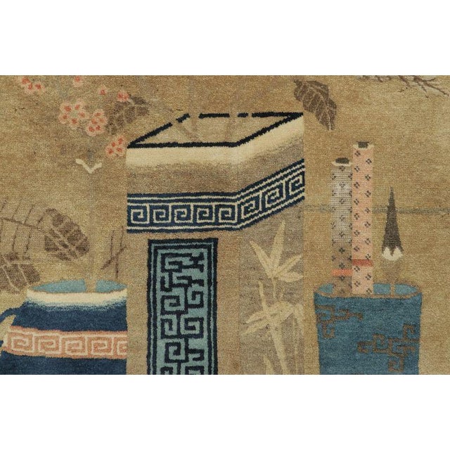 This antique 4x6 Chinese Peking rug, hand-knotted in wool circa 1900–1909, presents a refined pictorial layout centered on...