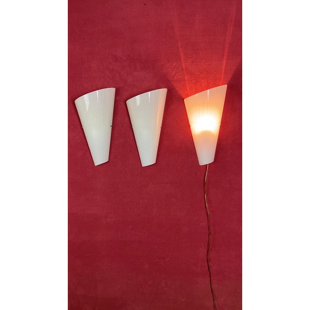 Set of 3 large Murano glass wall lamps, 1980s Metal structure, E27 lamp Intact and in good condition. Height 44 cm....