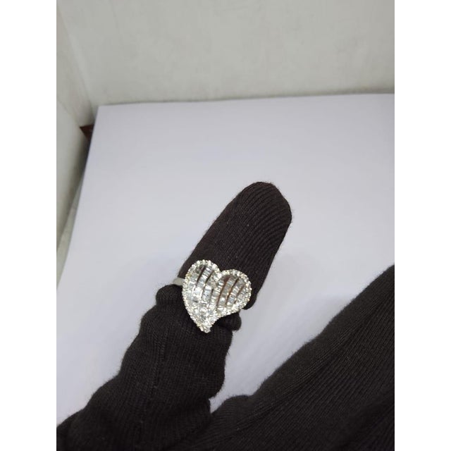 Gemstone details Gold Purity: 18K Solid Gold Diamond: 0.60 cts 18K gold Gross weight: 4.27 grams Net weight: 4.15 grams...