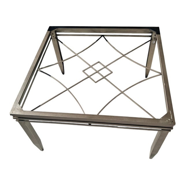 Stunning Hollywood Regency style cocktail table that combines architectural geometric symmetry with sleek mid-century...