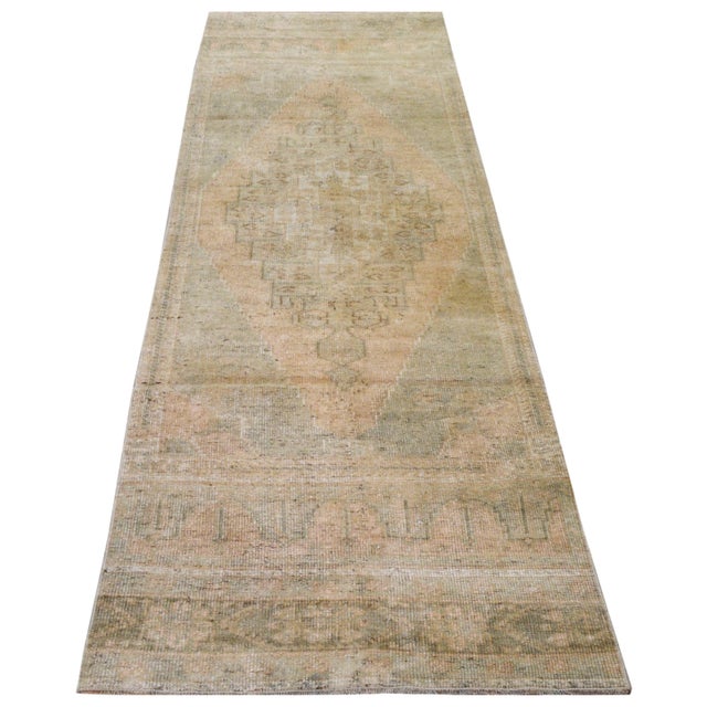 Hand-knotted with care using traditional rug-making techniques, this wool rug blends timeless craftsmanship with a modern...