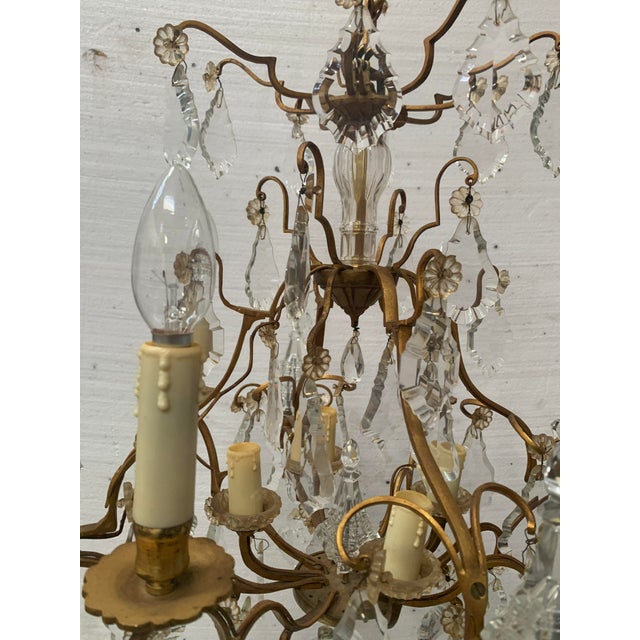 Louis XV style cage chandelier with crystal drops and glass shades Bronze frame and chain Eight-light chandelier Good...