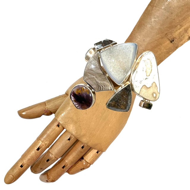 One-of-a-kind statement wrist cuff hand-crafted by the artisans of Studio Greytak - Missoula Montana. A conceptual art...