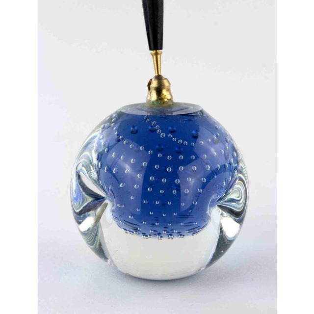 Murano Pen holder is a decorative object realized in the 1970s. A decorative blue colored Murano glass pen holder. An...