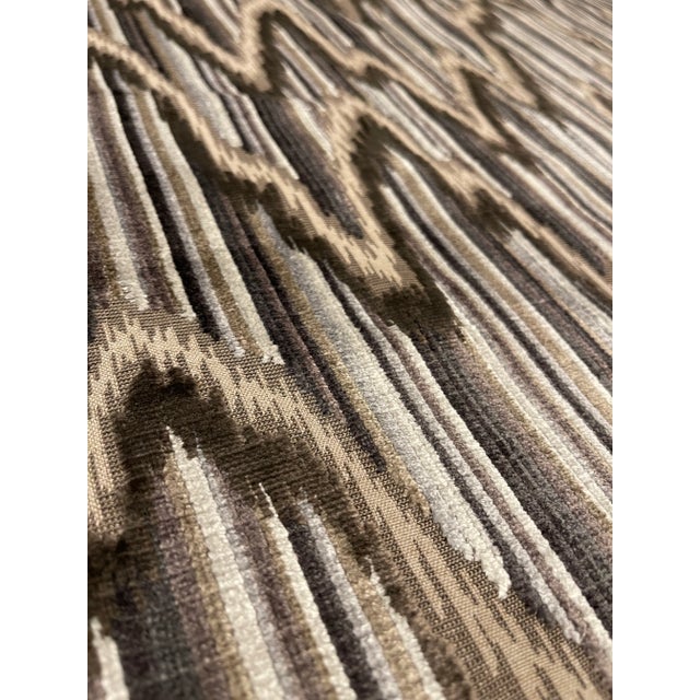 This earthy cut velvet marble design fabric has multitude of colors ranging from champagne, to light, gray to ivory , to...