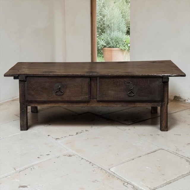 A 17th century rustic country Spanish oak coffee table with an incredible patina that only centuries of life can create....
