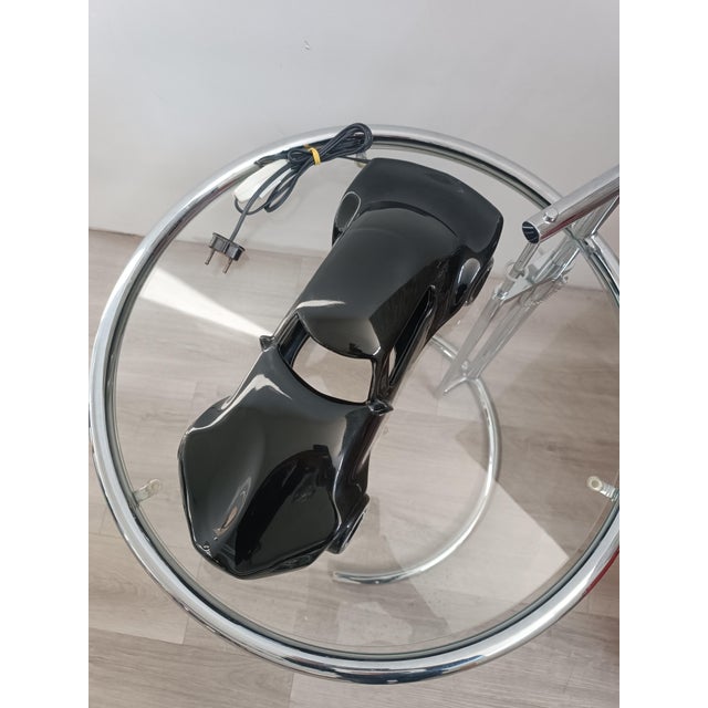 Exquisite vintage lamp. American car, sports coupe. All black ceramic, chrome-plated metal base. Beautiful reflections...