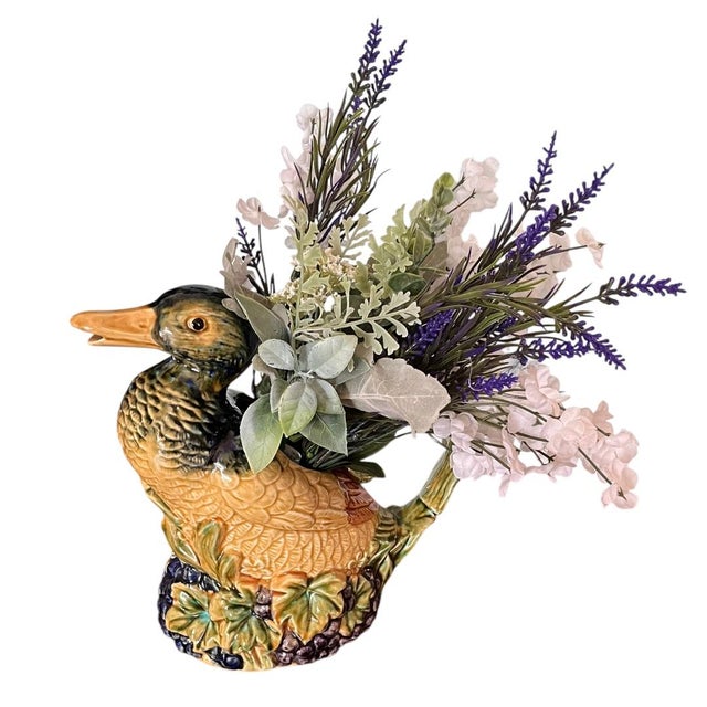 Whimsical vintage duck-shaped watering can. It can be used as a decorative piece, a pot for your favorite house plant or a...