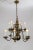 A chunky, heavy brass, Dutch Baroque style, 12-light chandelier, marvelously proportioned with huge center ball and...