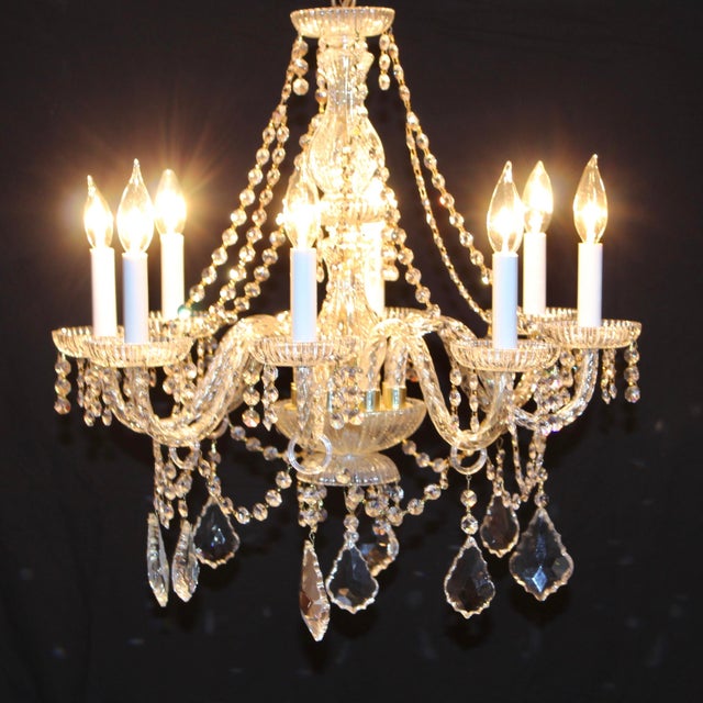 Designed in the classic Georgian and Maria Theresa traditions, this magnificent ceiling fixture features eight curving,...