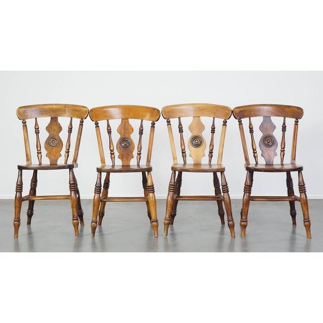 Set of 4 charming antique English dining room chairs from the mid-19th century. This set of 4 antique dining room chairs...