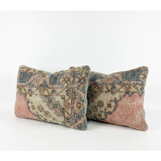 This beautiful 16'' x 24'' & 14'' x 24'' pillow cover set was made from authentic Turkish rug pieces. Bright colors of...