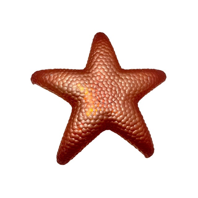 A set of four vintage 1970s AKCAM Turkish iridescent starfish bowls in orange, teal, blue, and olive green. The exterior...