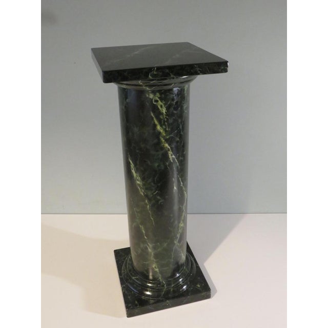 Classic style, round column in wood with black, green faux marble painting.