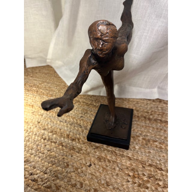 This is a beautifully crafted bronze finish sculpture replica of Degas' Dancer. This medium-sized statue stands at 18...