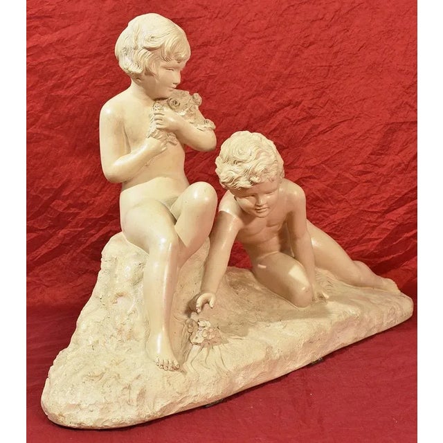 The Art Déco Sculpture proposed here is in Terracotta. Earthenware sculpture with Two Playing Children made in the early...