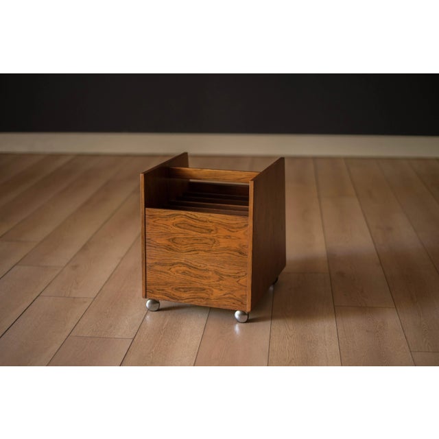Mid-Century Modern magazine LP vinyl record storage cart designed by Rolf Hesland for Bruksbo, Norway. This piece features...