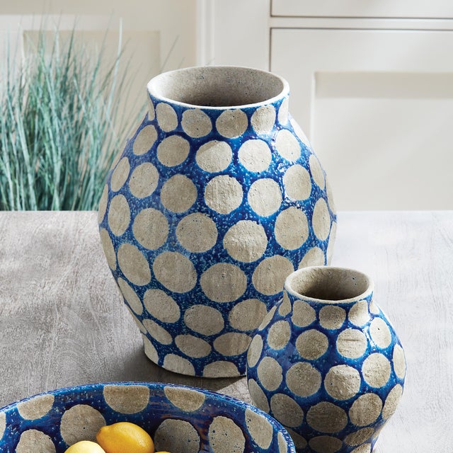 In a nod to midcentury pottery, this fun, fashion statement makes a memorable centerpiece. Fill with faux blooms, or leave...