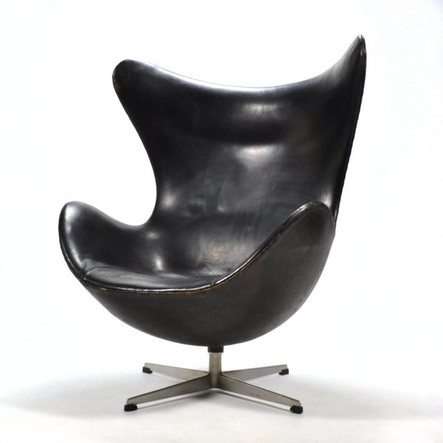 This example of Arne Jacobsen's iconic egg chair dates from the first year of production when the chair was made with an...