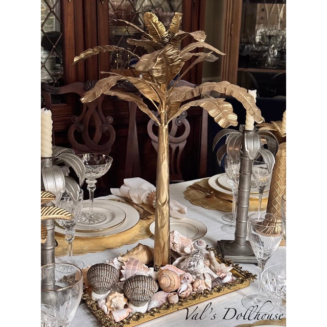 Presenting a pair of Mid-Century made in Japan salt and pepper shakers in a vintage kitsch shell motif. The finish is...