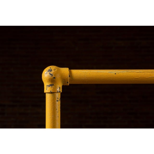 Vintage Industrial Pipe Rolling Garment Rack in Yellow For Sale In Chicago - Image 6 of 6