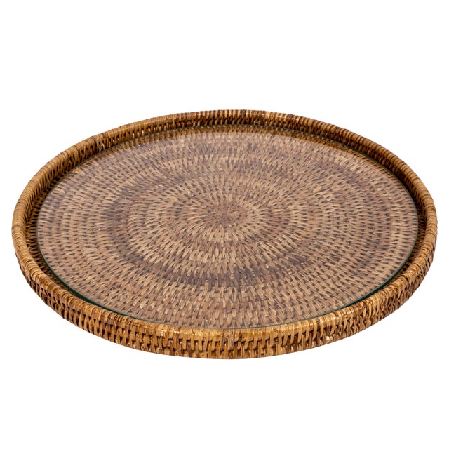 Our handwoven rattan round flat trays with glass insert offer a beautiful way to both decorate and protect your surfaces....
