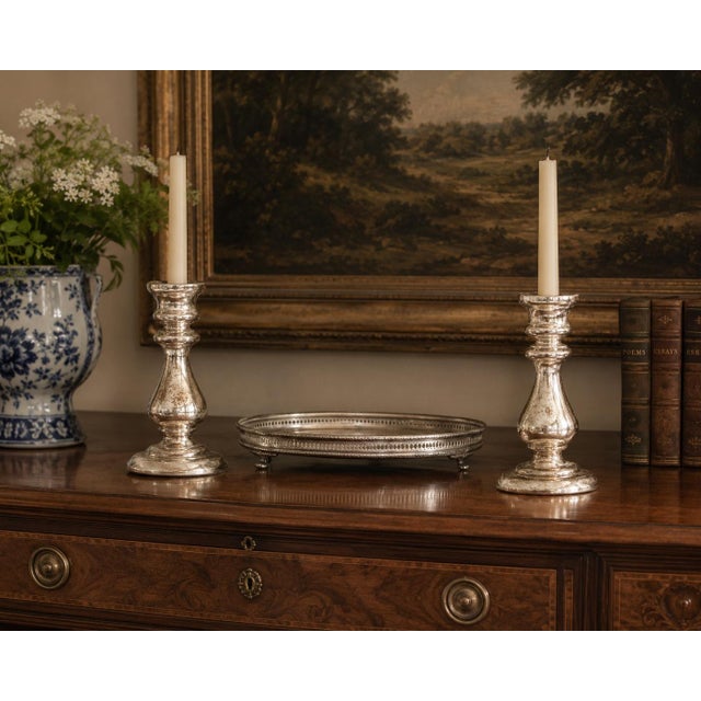 A lovely large pair of authentic antique 19th-Century hand blown mercury glass candlesticks from France. These stunning...
