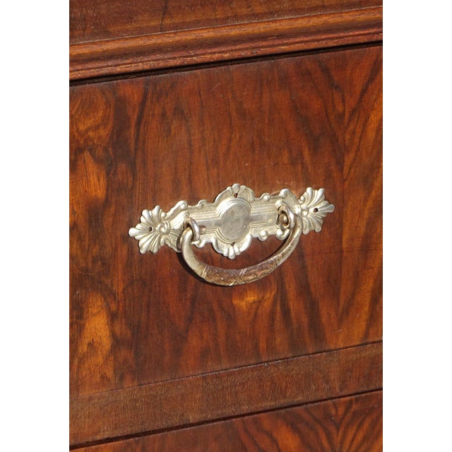 Large chest of drawers with 4 dovetailed drawers. the four drawer fronts are made of burr walnut, 1 cm thick planks. Each...