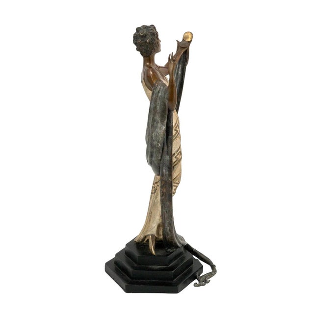 Cold painted bronze sculpture. Incised Erte signature with stamped numbered edition, foundry and date. Edition 280/375....