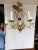 Beautiful giltiron 6 arm chandelier having an English regal vibe with bejeweled crown "coronet" at the top and cobalt blue...