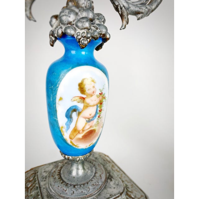 Bring timeless French elegance to your mantel, dining table, or library with this striking pair of antique three-light...