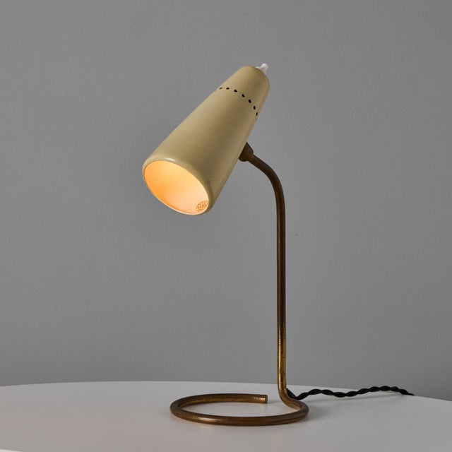 1950s Stilnovo Table Lamp with Original Yellow Label&nbsp; This elegantly sculptural table lamp is characteristic of the...