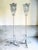 Pair of indoor/outdoor floor lamps in white lacquered wrought iron. Circa 1950-60. Height 171 cm. Footprint 54/55 cm. In...