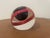 Vintage Czech art glass paperweight in the form of a small hut or house, dating from the 1960s–1970s. The sculptural...