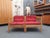 A very rare two-seater sofa by Jørgen Bækmark of Denmark. A beautifully designed piece from the 1960s. The sofa consists...