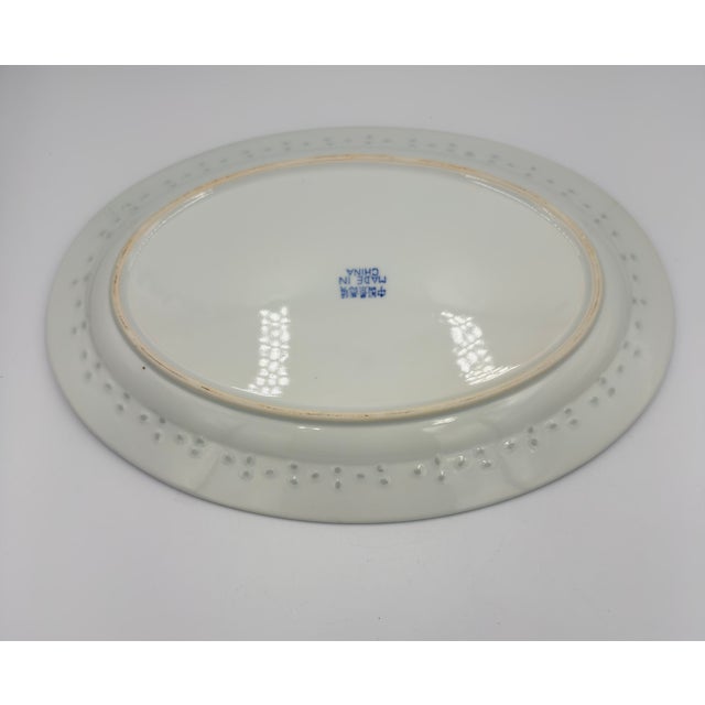 Elevate your table setting with the elegant Rice Flower series by Tienshan, a testament to fine Chinese craftsmanship. It...