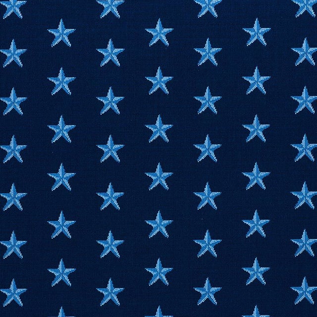 Hardwearing epingle velvet reprises an evergreen star motif reminiscent of needlepoint. Chameleon-like, it can embody a...