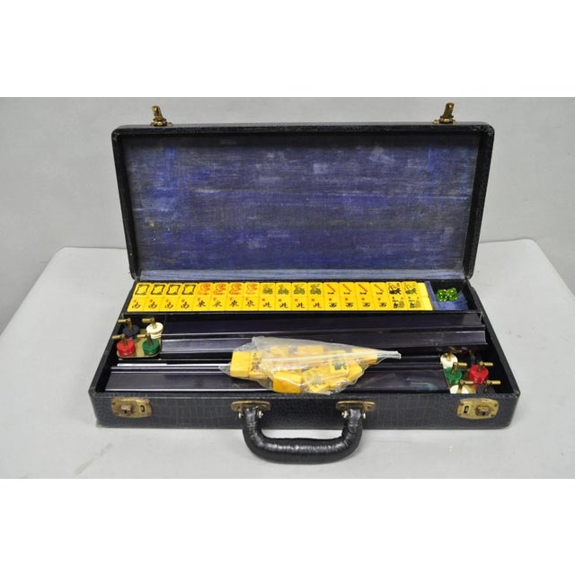 Vintage 1960s Mahjong Set Tiles in Case 162 Bakelite Tiles & 5 Racks. Circa Mid 20th Century. Measurements: Case 3.5" H x...