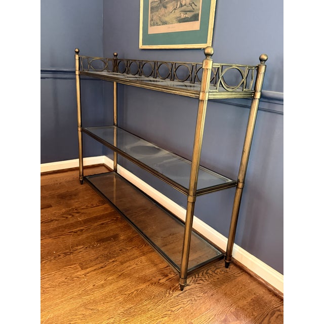 Ballard Design Grand Marquis Console Table At just 12" deep, this elegant, airy console fits nicely into an entry, at the...