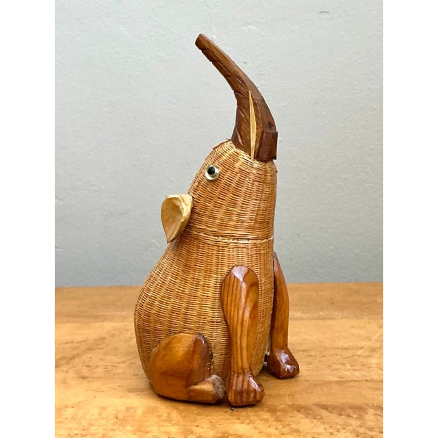 Artfully crafted using traditional Shanghai weaving techniques, this vintage rattan elephant figurine showcases...